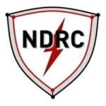 NDRC shield logo with red lightning bolt